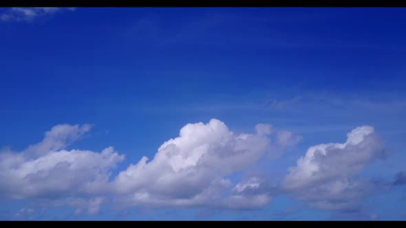 Aerial above travel of marine seashore beach lifestyle by blue sea with bright sand background of jo