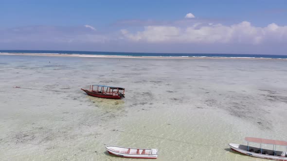 Ocean at Low Tide Aerial View Zanzibar Boats Stuck in Sand on the Shallows