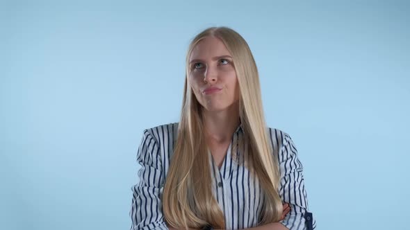 Young Blonde Woman Refusing Something and Showing That She Is Bored Enough