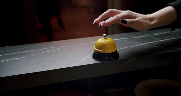 A Man Hand Presses Bell Button