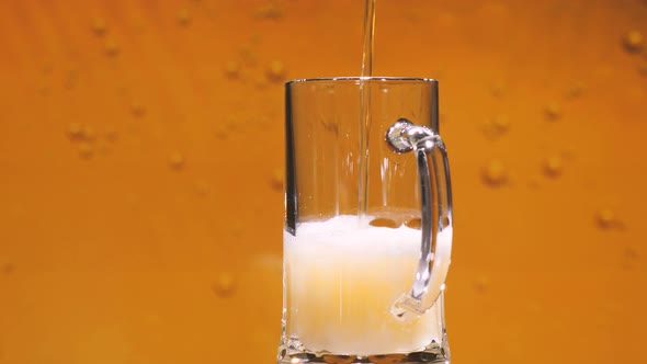 Beer pouring into mug