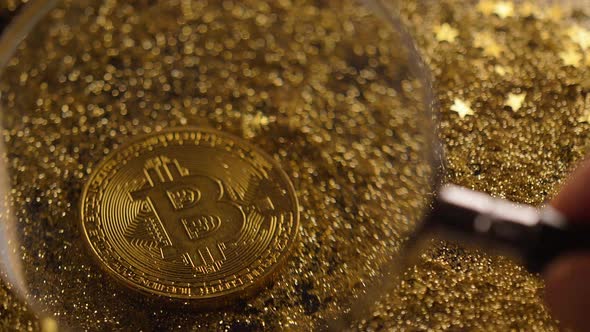 Magnifier Shows Beautiful Gold Bitcoin Model Macro