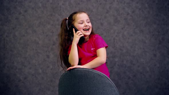 Beautiful Girl Talking on the Phone