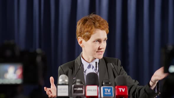 Female Politician Giving Speech on Live TV