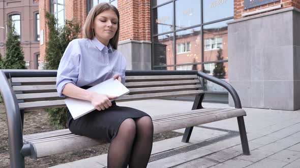 Outdoor Sitting Woman Leaving to Office for Interview
