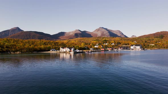View Of A Fish Farm Facility At The Harbor Of Senja Island, Troms og Finnmark, Norway. wide