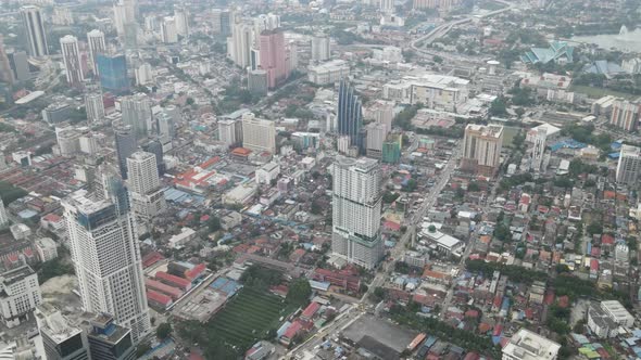 Aerial view of buildings, apartments, roads and shop lots in Kuala Lumpur City Centre