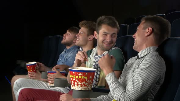 Young People Watching Movie in Cinema