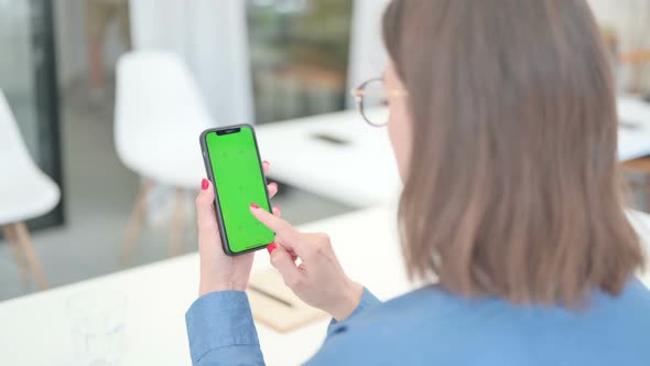 Using Smartphone with Green Mock Up Screen