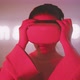 Young woman putting on vr goggles and starts experiencing the metaverse - VideoHive Item for Sale