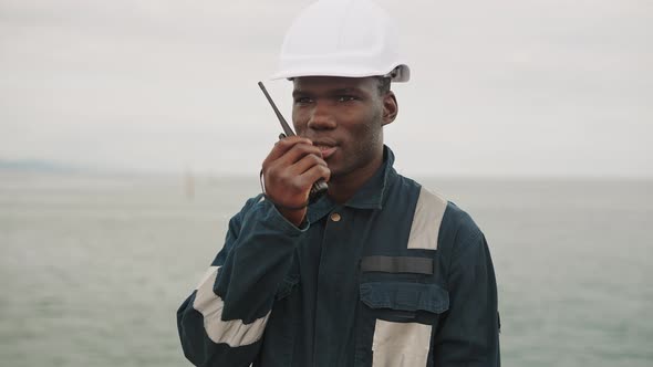 Seaman Has Communication with VHF Handheld Radio