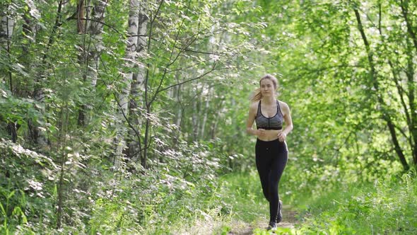 Running Girl Runs in Morning Park