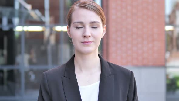 Outdoor Portrait of Young Businesswoman