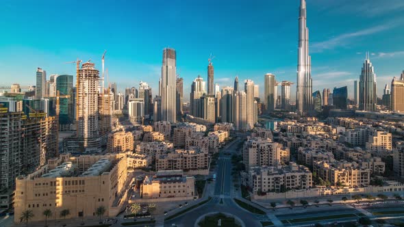 Dubai Downtown Skyline Timelapse with Burj Khalifa and Other Towers During Sunrise Paniramic View