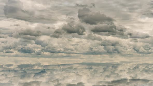 Futuristic Background Consisting of Time Lapse Clip of White Fluffy Clouds Over Blue Sky and Their