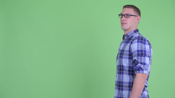 Profile View of Happy Young Hipster Man Smiling