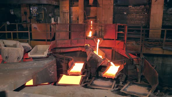 Smelter is Releasing Molten Copper Into Molds