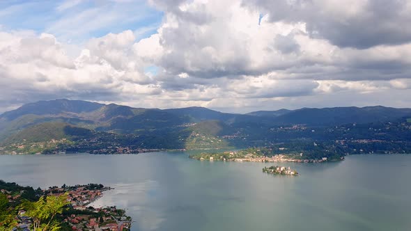 Pan right of isola San Giulio or Saint Julius island on Orta lake in Italy