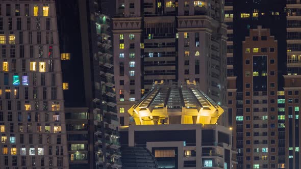 Evening View of Exterior Apartment Recidential Building Timelapse with Glowing Windows