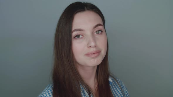 Portrait of the Girl with Sincere, Healthy Smile on Background