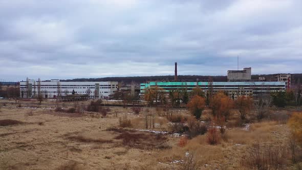 Old ruined factory among nature. 