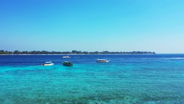 Tourist Boats Taking Vacationers For A Ride Through The Beautiful Clean Waters Of The Maldives - Low