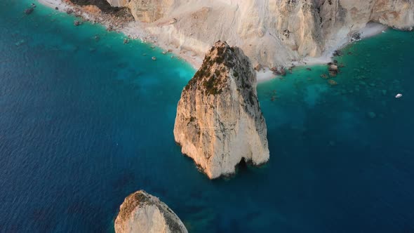 Aerial seascape at the day time. Bay and rocks. Blue water background in the summer.