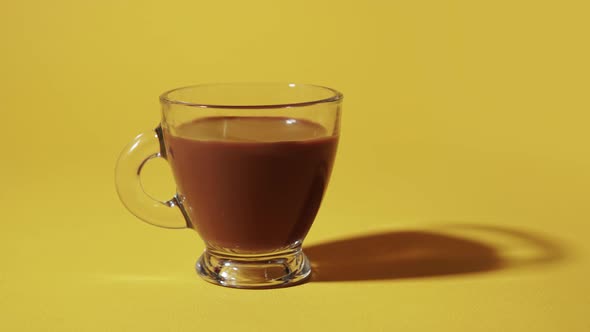 Coffee poured in stop motion into the cup