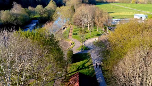 aerial view with people walking around the area in the recreational area and river beach of Tapia, C