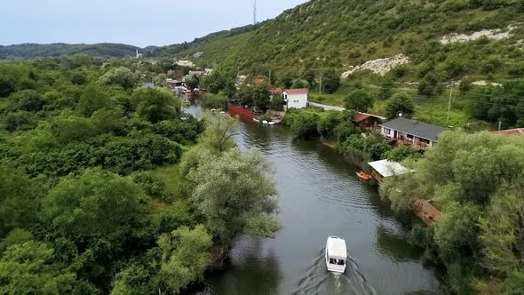 Aerial view Agva, Yesilcay River. A tour boat is passing on the river. A wonderful town located in I