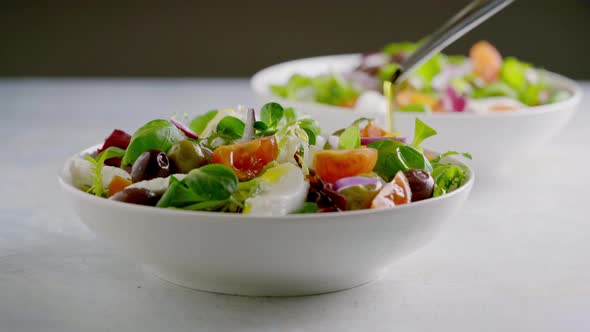 Fresh Green Salad with Cherry Tomato Mozzarella and Olives