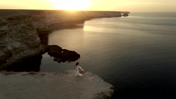 Arch Shape Grotto in Ocean in Ocean Island, Bride After Wedding in Honeymoon