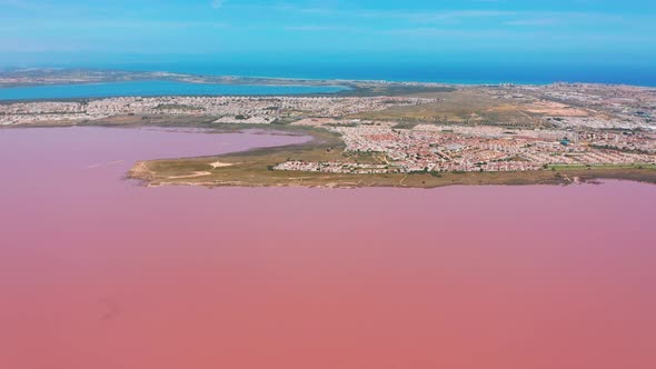 Aerial View. Salt Sea Water Evaporation Ponds with Pink Colour