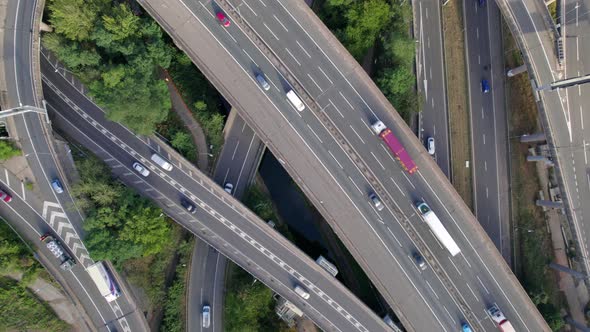Vehicles Driving Through a Mixing Bowl Interchange Aerial View