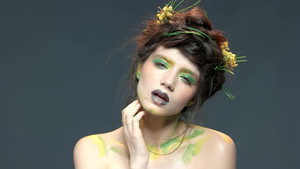 Girl Wearing Nature Themed Makeup.