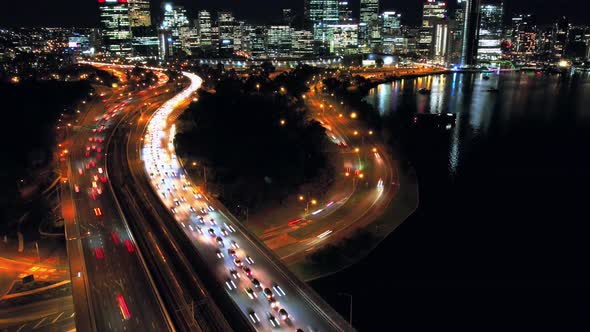 Hyperlapse of Perth City at night in peak hour traffic pushing forward
