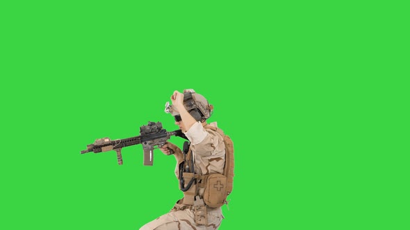 United States Ranger Walking In, Making Hold Gesture and Then Making Go Gesture on a Green Screen
