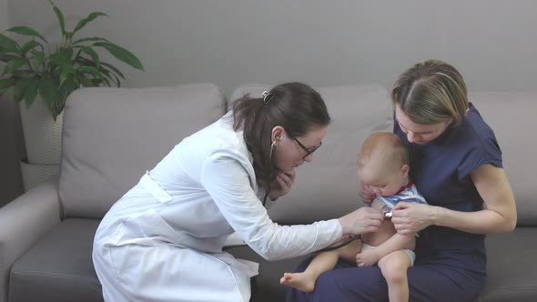 Home Appointment Pediatrician Child Baby Mother Doctor Examines Stethoscope Kid