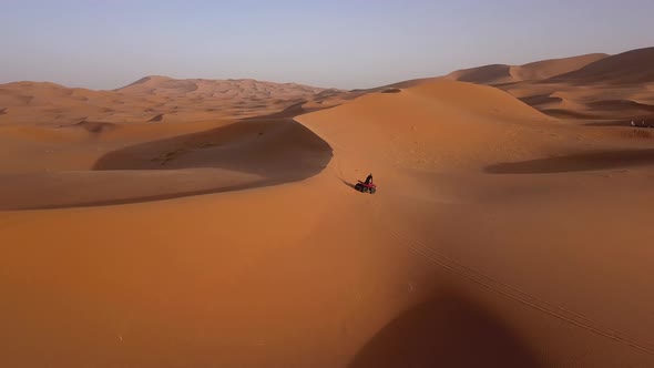 AERIAL: ATV Driving in Sahara Desert