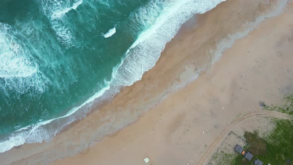 High and powerful waves coming fast to the beach, waves in winter day