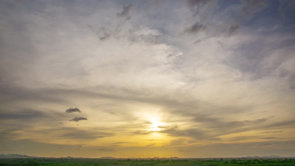 View of Colorful dramatic sky sunset or sunrise with Moving clouds background alt