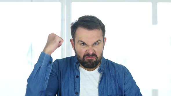 Cross Hands of Rejecting Man Sitting in Office