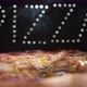 Delicious Fresh Italian Pizza On A Black Background With The Effect Of Light Inscription Pizza - VideoHive Item for Sale