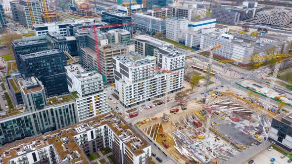 Aerial Hyperlapse of Construction Cranes and Building Construction in the Center of Warsaw Poland