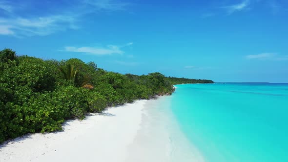 Aerial abstract of marine coastline beach break by clear ocean and white sand background of a dayout