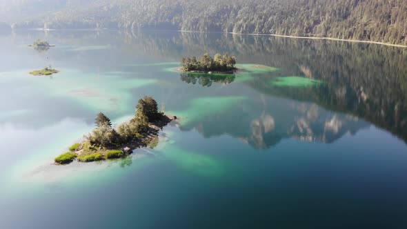 beautiful drone video of an lake and mountains, eibsee in bavaria