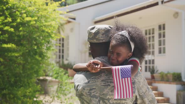 Father and daughter hugging each other