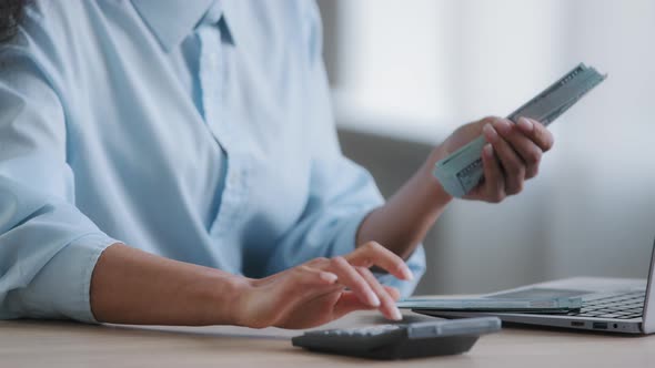 Unknown Female Business Woman Bookkeeper Counting Stack of Hundred Cash Dollars Calculating Salary