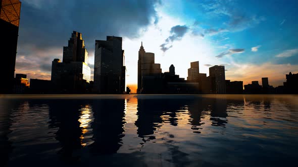 Skyline with Skyscrapers and Sea at Sunset