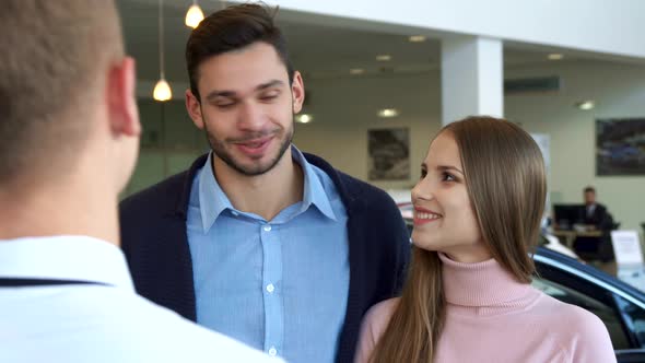 Couple Buys the Car at the Dealership